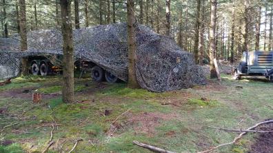 Le PC camouflé en forêt